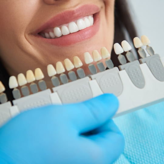 Discussing expenses of dental implant treatment.